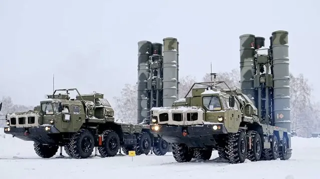 In this photo taken from video provided by the Russian Defense Ministry Press Service on Thursday, February 3, 2022, a view of Russian S-400 air defense missile systems in position during a military exercise, in Siberia, Russia. (Photo by Russian Defense Ministry Press Service via AP Photo)