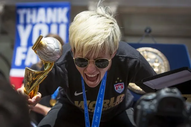 Megan Rapinoe poses for members of the press during a reception at New York City Hall hosted by New York City Mayor Bill de Blasio for the U.S. women's soccer team following their ticker tape parade to celebrate their World Cup final win over Japan on Sunday, in New York, July 10, 2015. (Photo by Andrew Kelly/Reuters)