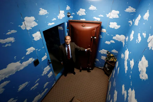 Seiichiro Nishimoto, CEO of Shelter Co., poses in front of a blast door at the entrance of a model room for his company's nuclear shelters during an interview with Reuters in Osaka, Japan on April 26, 2017. (Photo by Kim Kyung-Hoon/Reuters)