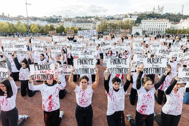 A group to fight against gender-based and sexual violence and feminicides, organized an happening in Lyon on Bellecour square in France on Saturday 9 November, where  29 women dressed in white and were covered in blood, displaying the first names of each of the victims. France, Lyon, Saturday 9 November 2019. (Photo by Konrad K./SIPA Press)