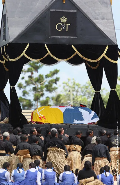 The Royal casket of King George Tupou V is carried towards the Royal Tombs during the State Funeral held for King George Tupou V at Mala'ekula in Nuku'alofa, Tonga