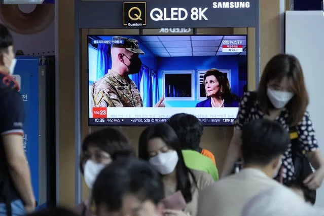 A TV screen shows a news program reporting about U.S. House Speaker Nancy Pelosi was visiting the Joint Security Area of the inter-Korean truce village of Panmunjom, at the Seoul Railway Station in Seoul, South Korea, Friday, August 5, 2022. North Korea on Saturday, August 6, called U.S. House Speaker Pelosi “the worst destroyer of international peace and stability,” accusing her of inciting anti-North Korea sentiment and enraging China during her Asian tour earlier this week.(Photo by Ahn Young-joon/AP Photo)