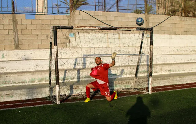 Palestinians who have lost limbs play football at the Tiberias Club in Beit Lahia, in the northern Gaza Strip on September 17, 2022. Many players have lost their leg or arm to Israeli soldiers during Gaza border protests, during Israelâ€s military assaults, and in car accidents. The athletes, some of whom rely on crutches to move around and dart, are a show of perseverance amid the extreme challenges they face in the blockaded Gaza. (Photo by Ahmad Hasaballah/IMAGESLIVE via ZUMA Press Wire/Rex Features/Shutterstock)