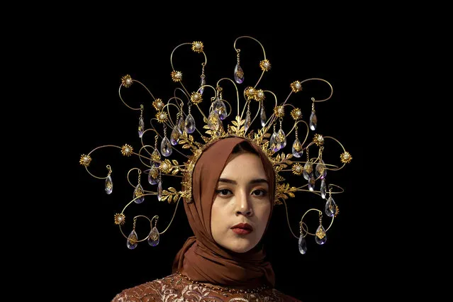 A model showcases designs by Listya Ayu during Surabaya Fashion Parade 2022 at Tunjungan Plaza Convention Hall on October 07, 2022 in Surabaya, Indonesia. (Photo by Robertus Pudyanto/Getty Images)