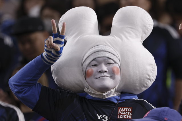 A fan reacts before the start of the FIFA World Cup 2026 qualification match between Japan and Saudi Arabia in Saitama, Japan, 25 March 2025. (Photo by Franck Robichon/EPA)