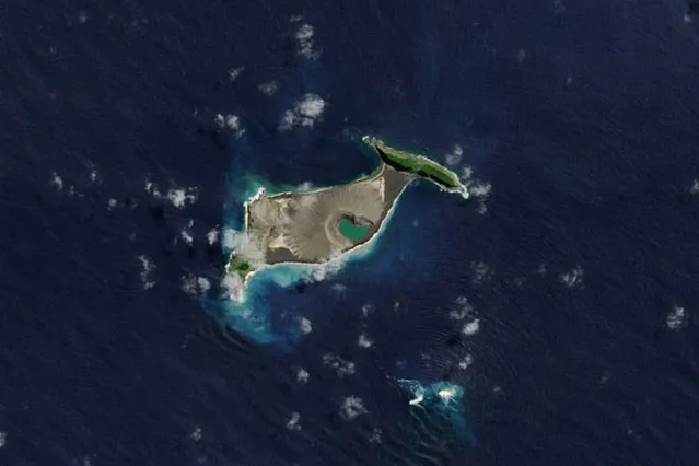 A handout photo made available by NASA Earth Observatory on 13 December 2017 shows an image acquired by the Operational Land Imager on the Landsat 8 satellite of an island unofficially known as Hunga Tonga-Hunga Ha'apai in the South Pacific Ocean, 08 September 2017. The newly formed island was expected to last for just a few months after a submarine volcano erupted violently in the South Pacific in December 2014. It now appears to have a six to 30-year lease on life, according to a NASA-led study. (Photo by EPA/EFE/NASA Earth Observatory)