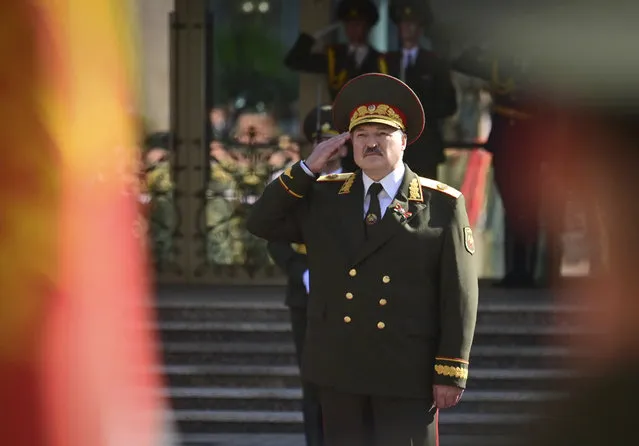 Belarusian President Alexander Lukashenko salutes during his inauguration ceremony at the Palace of the Independence in Minsk, Belarus, Wednesday, September 23, 2020. Lukashenko of Belarus has assumed his sixth term of office in an inauguration ceremony that wasn't announced in advance. State news agency BelTA reported that Wednesday's ceremony is taking place in the capital of Minsk, with several hundred top government official present. (Photo by Andrei Stasevich/BelTA/Pool Photo via AP Photo)