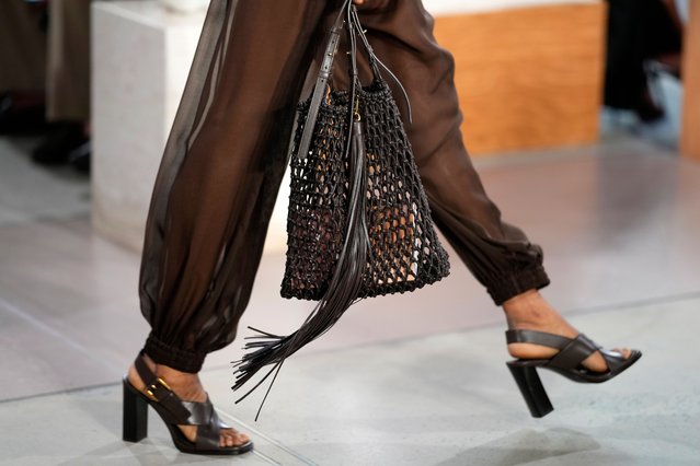 A model walks the runway during the Michael Kors Spring/Summer 2026 fashion show as part of New York Fashion Week on Thursday, Sept. 11, 2025, in New York. (Photo by Charles Sykes/Invision/AP Photo)