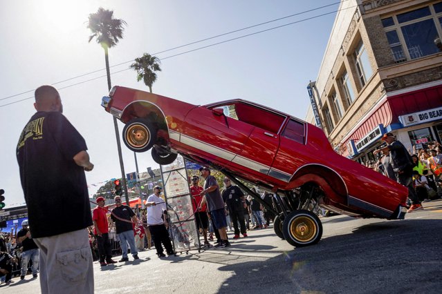 A lowrider takes part in a lowrider hopping competition, in San Francisco, California, U.S., September 20, 2025. (Photo by Manuel Orbegozo/Reuters)