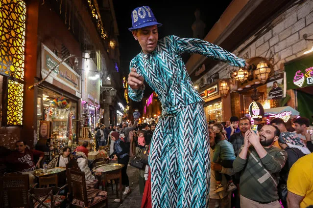 A traditional show during the holy month of Ramadan on Al-Muizz li-Din Allah Al-Fatimi Street on April 6, 2023 in Cairo, Egypt. Fasting, during the holy month of Ramadan, is one of the five pillars of Islam and is required for all healthy Muslims.(Photo by Fadel Dawod/Getty Images)