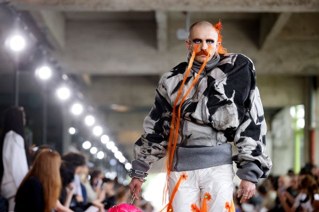 A model presents a creation by students of the Bachelor of Arts in Fashion design as part of their Menswear ready-to-wear Spring/Summer 2025 collection show during Men's Fashion Week in Paris, France, on June 18, 2024. (Photo by Johanna Geron/Reuters)