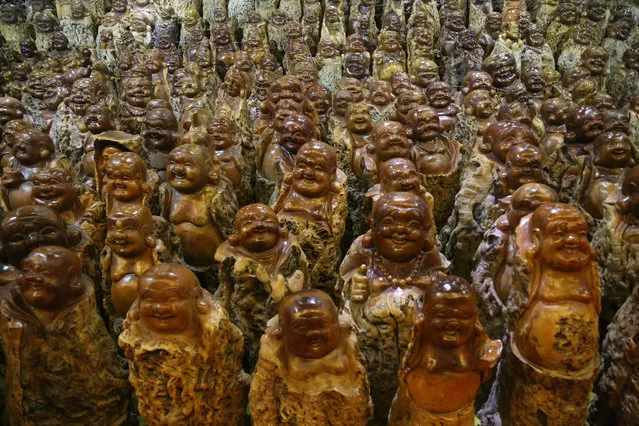 More than 9,000 figures of Buddha made from jujube trees are seen at a Buddha garden of Haoxiangni Jujube Co., Ltd. on November 23, 2015 in Zhengzhou, Henan Province of China. It's said that jujube is widely cultivated in local areas and these Buddha statues are manufactured with waste jujube trees. (Photo by ChinaFotoPress/ChinaFotoPress via Getty Images)