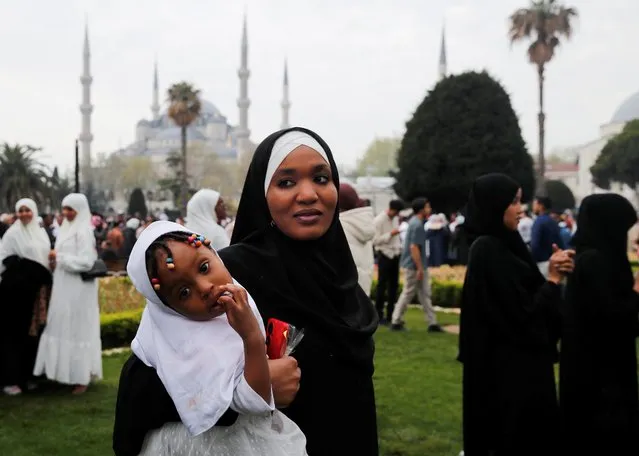 People attend Eid al-Fitr prayers marking the end of the fasting month of Ramadan, in Istanbul, Turkey on April 21, 2023. (Photo by Dilara Senkaya/Reuters)