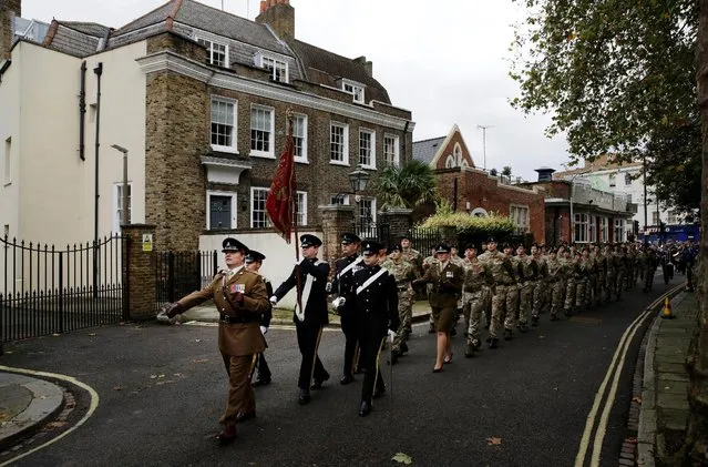 Military personnel march during a Remembrance Sunday parade through Fulham in West London, Britain November 8, 2015. (Photo by Kevin Coombs/Reuters)