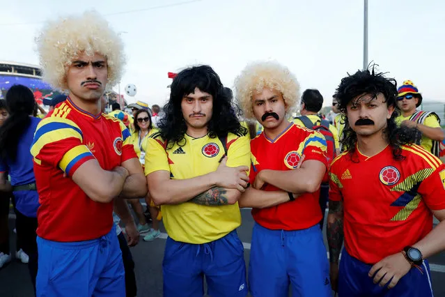 Colombia fans wearing wigs outside the stadium before the Russia 2018 World Cup Group H football match between Poland and Colombia at the Kazan Arena in Kazan on June 24, 2018. (Photo by Jorge Silva/Reuters)