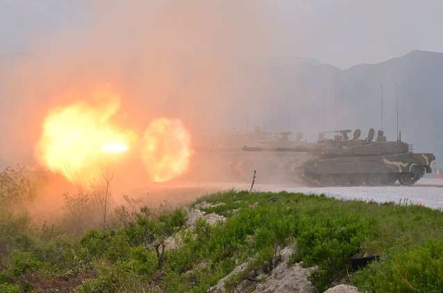 South Korea's K-2 tanks fire during a South Korea-US joint military drill at Seungjin Fire Training Field in Pocheon on May 25, 2023. (Photo by Yelim Lee/AFP Photo)