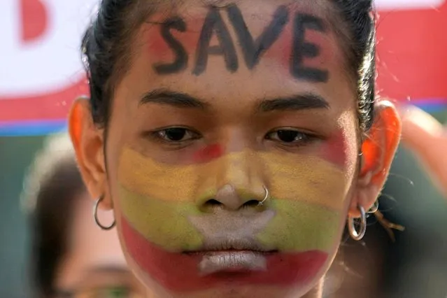 A demonstrator takes part in a protest against the military coup in Yangon, Myanmar, February 17, 2021. (Photo by Reuters/Stringer)