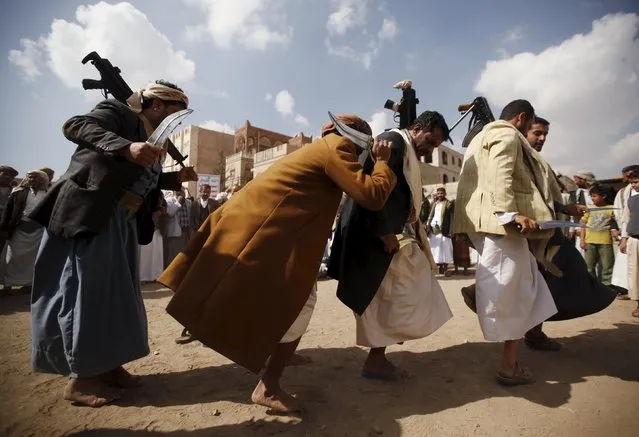 Tribesmen loyal to the Houthi movement perform the traditional Baraa dance at a gathering to show their support for the group, in Yemen's capital Sanaa December 15, 2015. (Photo by Khaled Abdullah/Reuters)