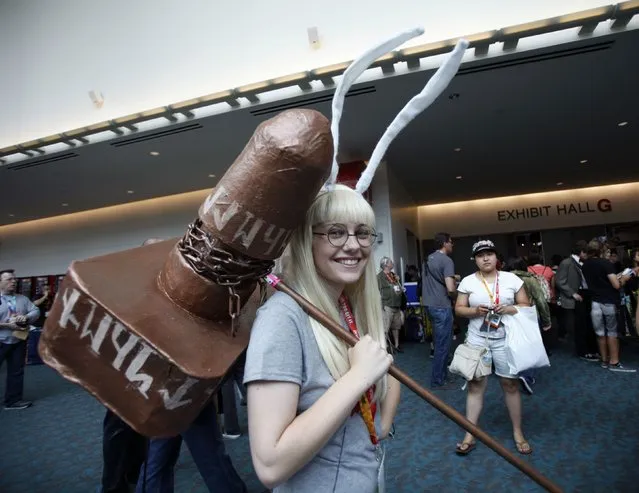 Attendee Annie Cox, who is dressed like the character Barbara Thorson from the comic I Kill Giants, poses during Comic-Con international convention in San Diego, California July 13, 2012. (Photo by Mario Anzuoni/Reuters)