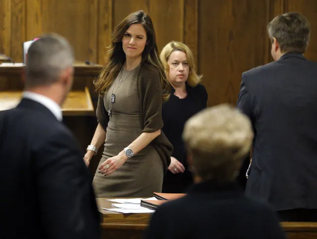 Taya Kyle, wife of former Navy SEAL Chris Kyle gives a wink to Judy Littlefield, mother of Chad Littlefield, (R) during the capital murder trial of former Marine Cpl. Eddie Ray Routh at the Erath County Donald R. Jones Justice Center February 11, 2015 in Stephenville, Texas. (Photo by Tom Fox/Getty Images)