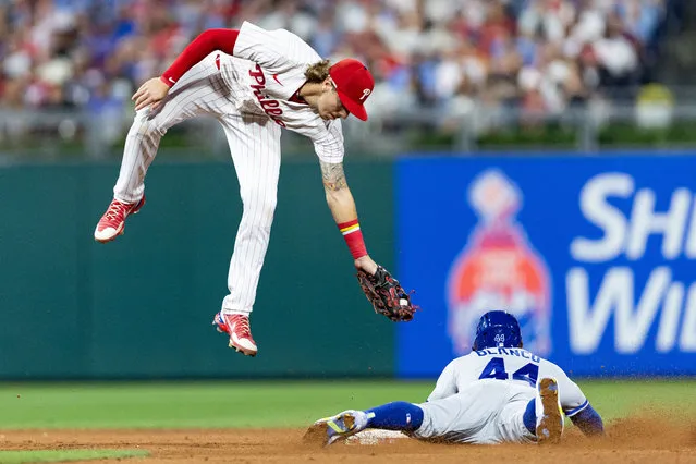 Kansas City Royals left fielder Dairon Blanco (44) steals second past Philadelphia Phillies second baseman Bryson Stott (5) during the sixth inning at Citizens Bank Park in Philadelphia, Pennsylvania on August 4, 2023. (Photo by Bill Streicher-USA TODAY Sports)