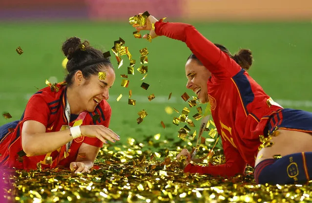 Oihane Hernandez and Claudia Zornoza of Spain celebrate after the FIFA Women's World Cup Australia & New Zealand 2023 Final match between Spain and England at Stadium Australia on August 20, 2023 in Sydney, Australia. (Photo by Carl Recine/Reuters)