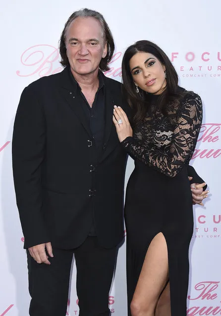 In this June 12, 2017 file photo, Quentin Tarantino, left and Daniela Pick arrive at the premiere of “The Beguiled” in Los Angeles. Tarantino has married Israeli singer and model Daniella Pick. People magazine reports that the couple was married in a small ceremony in Los Angeles on Thursday, November 22, 2018, and a larger evening gathering is planned. The two met in 2009 and became engaged last year. (Photo by Jordan Strauss/Invision/AP Photo)
