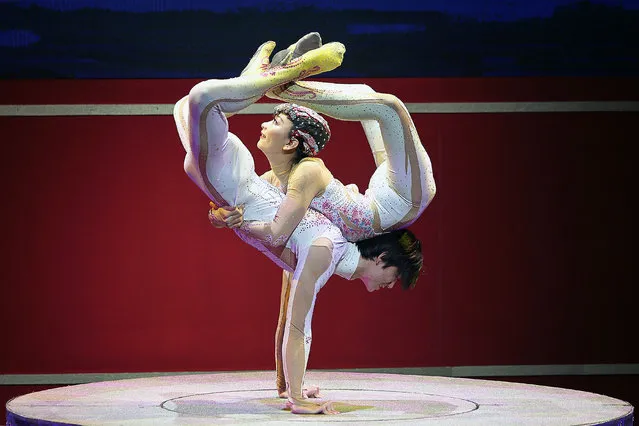 Acrobats of China's Guangdong Acrobatic Troupe perform during the “Cultures of China, Festival of Spring” at the Philippine International Convention Center in Pasay City, Philippines on March 1, 2016. (Photo by Rouelle Umali/Xinhua via ZUMA Wire)