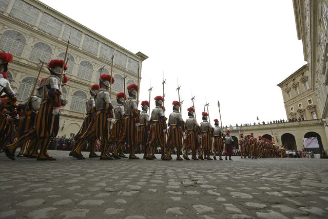 Vatican Swiss guards march on their way to a swearing-in ceremony, at the Vatican, Wednesday, May 6, 2015. (Photo by Alessandra Tarantino/AP Photo)