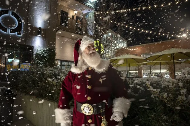 Stephen Arnold, the president of the International Brotherhood of Real Bearded Santas, during an appearance at Overton Square in Memphis, December 17, 2022. Like other in-person workers, Santa took a hit the first two years of the pandemic. But he’s back in a big way. (Photo by Andrea Morales/The New York Times)