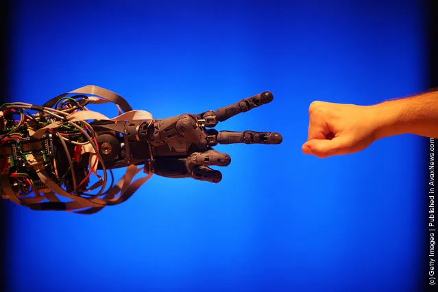 Life-size humanoid robot BERTI (Bristol EluMotion Robotic Torso number 1 or RT-1)  plays the game rock-paper-scissors