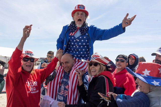 Supporters of former President Donald Trump gather for a weekend Trump rally on the Jersey Shore beachfront on May 11, 2024, in Wildwood, New Jersey. The rally is held during a weekend break from Trump's hush money trial in New York City, (Photo by Andrew Lichtenstein/Corbis via Getty Images)
