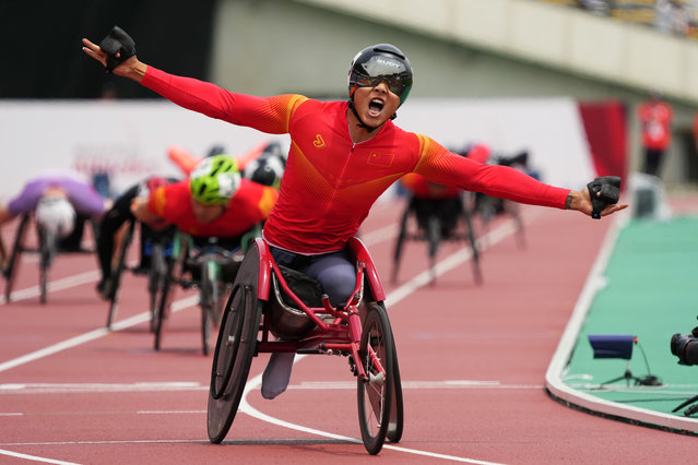 Hua Jin of China celebrates winning the gold medal after competing in the Men's 1500m T54 final during day six of the World Para Athletics Championships Kobe at Kobe Universiade Memorial Stadium on May 22, 2024 in Kobe, Hyogo, Japan.  (Photo by Toru Hanai/Getty Images)
