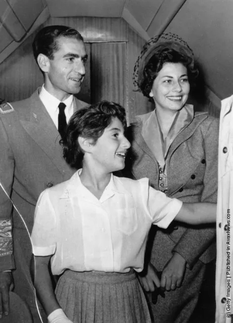 1953:  Mohammed Reza Pahlavi, Shah of Iran, with his wife Soraya, Queen of Persia and daughter Princess Shahnaz at the airport at Tehran, bound for Switzerland.  The Shah left Persia for an indefinite period during which a Regency Council governed the country