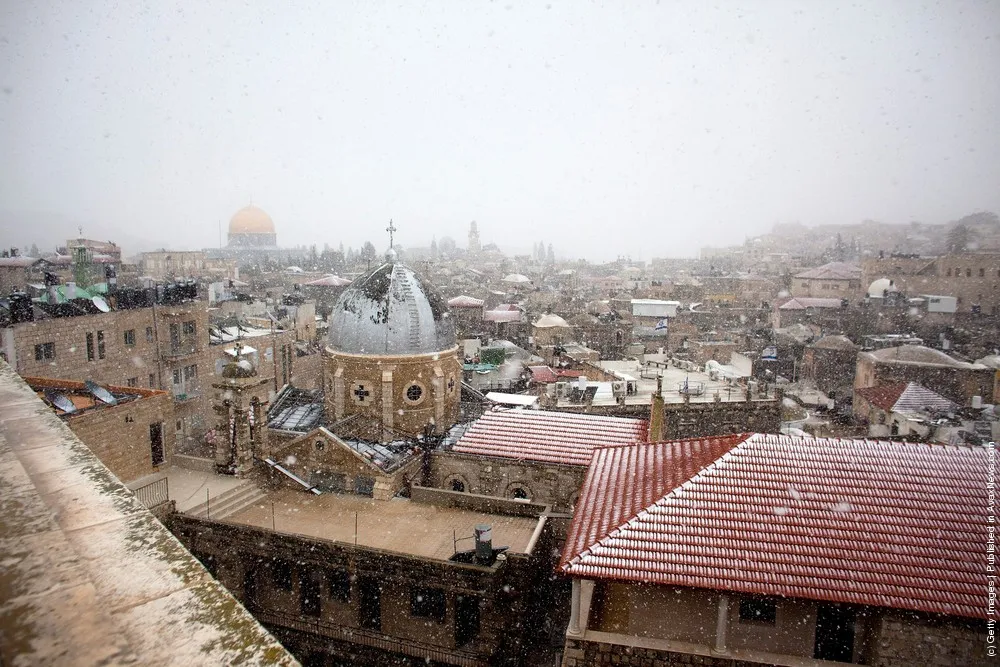 Snow Falls on Jerusalem and Hebron