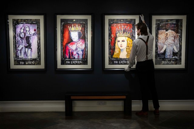 A collection of paintings titled “Tarot” by actor Johnny Depp are displayed at Castle Fine Art gallery on Wednesday, July 17, 2024 in London. The paintings reflect chapters in his personal journey and go on sale on July 18, 2024. (Photo by Scott A. Garfitt/Invision/AP Photo)