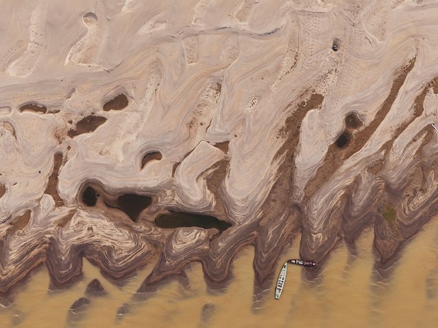 A drone view shows sandbanks due to the worst in history drought affecting the Madeira River in Humaita, Amazonas state, Brazil on September 4, 2024. (Photo by Bruno Kelly/Reuters)