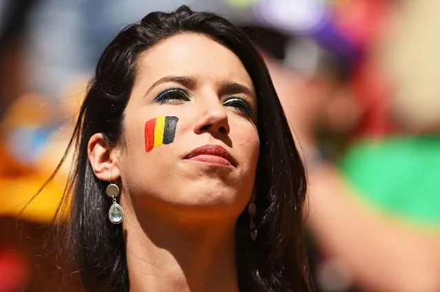 A Belgium fan enjoys the atmosphere prior to the 2014 FIFA World Cup Brazil Quarter Final match between Argentina and Belgium at Estadio Nacional on July 5, 2014 in Brasilia, Brazil. (Photo by Matthias Hangst/Getty Images)
