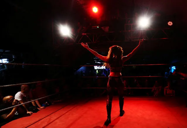 Wrestlers perform at an all female wrestling event in London. England on August 17, 2017. (Photo by Neil Hall/Reuters)