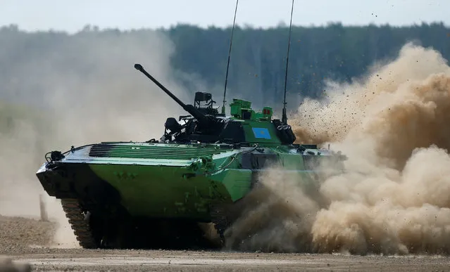 A BMP-2 amphibious infantry fighting vehicle, operated by a crew from Kazakhstan, drives during a competition of the International Army Games 2016, at a range in the settlement of Alabino outside Moscow, Russia, August 2, 2016. (Photo by Maxim Shemetov/Reuters)