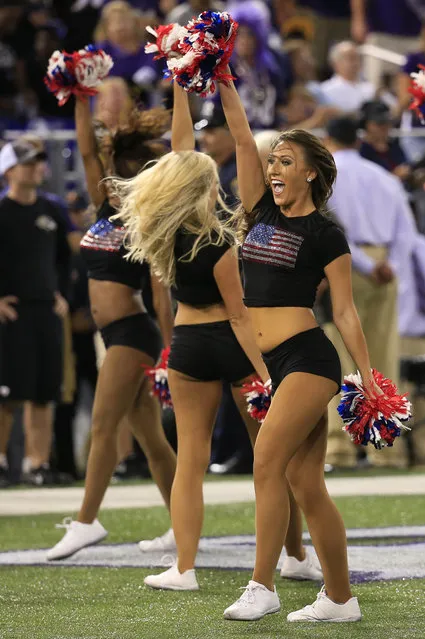Baltimore Ravens cheerleaders cheer during their game against the Pittsburgh Steelers at M&T Bank Stadium on September 11, 2014 in Baltimore, Maryland. (Photo by Rob Carr/Getty Images)