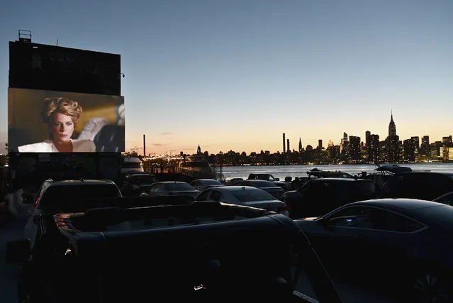 People watch a movie at the Skyline Drive-In NYC cinema experience on June 16, 2020 in the Brooklyn Borough of New York City, amid the novel coronavirus pandemic. (Photo by Angela Weiss/AFP Photo)