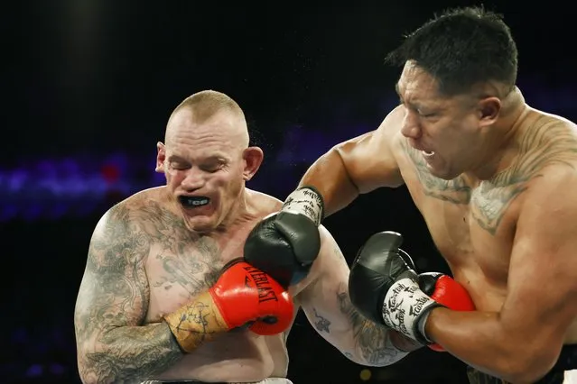George Peterson and Gary Phillips trade punches in their heavyweight bout during the Paul Gallen and Justin Hodges fight night at the Aware Super Theatre on November 23, 2022 in Sydney, Australia. (Photo by Mark Evans/Getty Images)