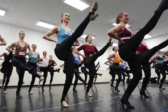 Dancers rehearse choreography before an audition for the Radio City Rockettes at Radio City Music Hall, Tuesday, April 22, 2025, in New York. (Photo by Julia Demaree Nikhinson/AP Photo)