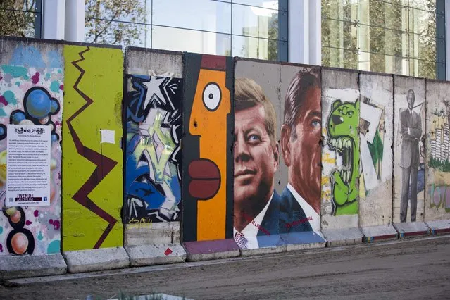 Ten segments of the Berlin Wall, which constitute the longest stretch outside of Berlin, are seen on display in Los Angeles, California September 18, 2014. (Photo by Mario Anzuoni/Reuters)