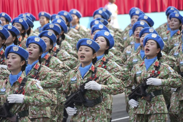 Vietnamese troops march during a parade to commemorate the 50th anniversary of the end of the Vietnam War in Ho Chi Minh City, Vietnam Wednesday, April 30, 2025. (Photo by Hau Dinh/AP Photo)