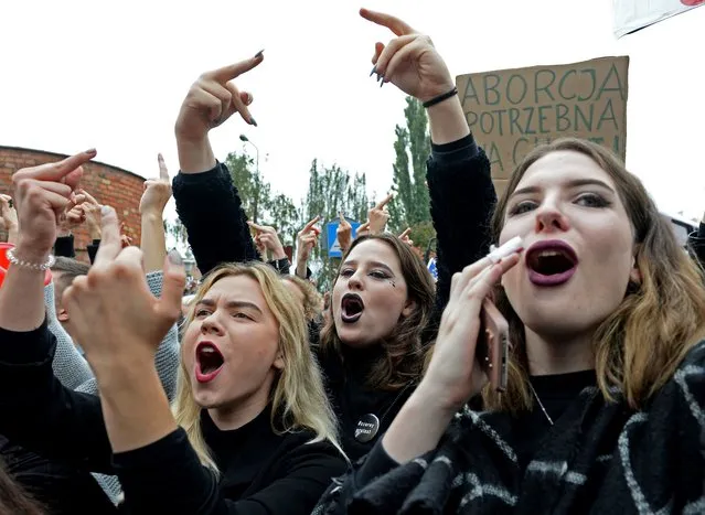 Polish women take part in a nationwide strike and demonstration to protest against a legislative proposal for a total ban of abortion on October 3, 2016 in Warsaw. (Photo by Janek Skarzynski/AFP Photo)