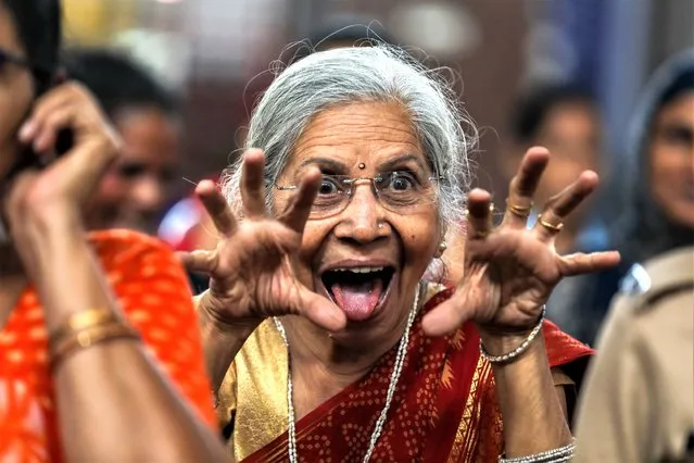 An Indian woman reacts while performing yoga at a railway station on International Women's Day, organised by Heal-Station in association with Western Railway, in Mumbai, India, 08 March 2023. International Women's Day (IWD) is observed annually on 08 March worldwide to highlight women's rights, as well as issues such as violence and abuse against women. The theme of IWD 2023 is “DigitALL: Innovation and technology for gender equality”. According to the United Nations, 37 percent of women around the world do not use the internet, leading to a digital gender gap that widens economic and social inequalities. (Photo by Divyakant Solanki/EPA/EFE/Rex Features/Shutterstock)