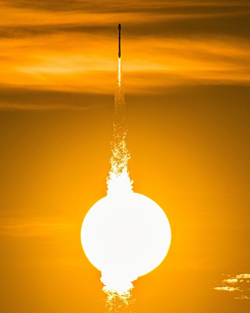 A SpaceX Falcon 9 rocket passes in front of the sun as it launches a Rideshare mission carrying a pair of satellites, NASA's IMAP and NOAA's SWFO-L1 28, from Launch Complex 39A at the Kennedy Space Center, Florida on Wednesday, September 24, 2025. IMAP will study the sun's heliosphere while NOAA's SWFO-L1 will observe its weather activity. (Photo by Joe Marino/UPI via Alamy Live News)
