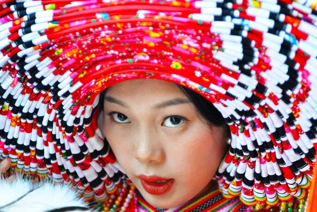 A woman wears a Yao bridal headdress in Hezhou, Guangxi, China on January 6, 2021. (Photo by Sipa Asia/Rex Features/Shutterstock)